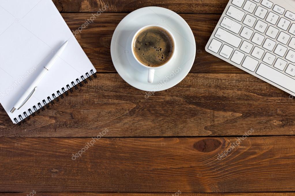 Office Composition with Electronics Stationery and Coffee on Hardwood
