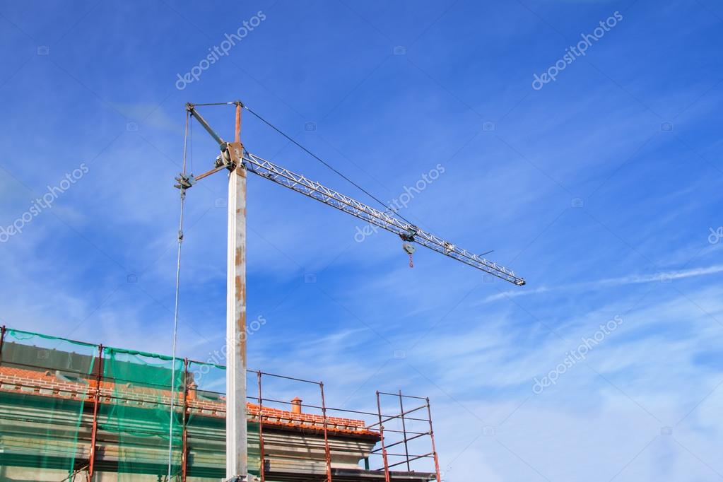 Small construction crane Stock Photo by ©lucagal 62919235