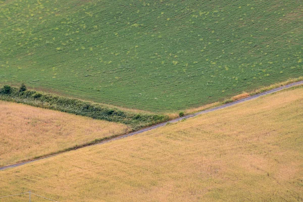 Flygfoto över ett hörn mellan tre fält — Stockfoto