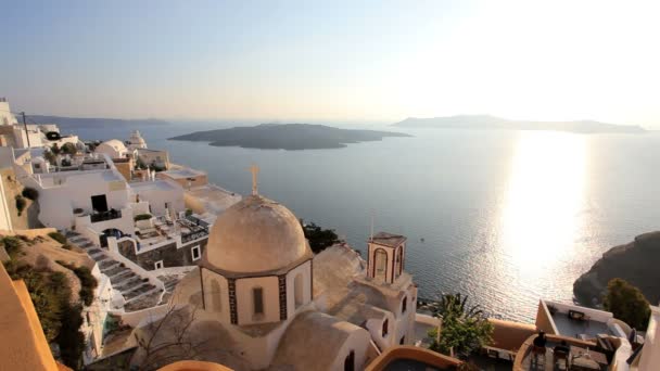 Blue Dome of the local church and the white washed houses of Thira Aegean Sea, Greece — Stock Video