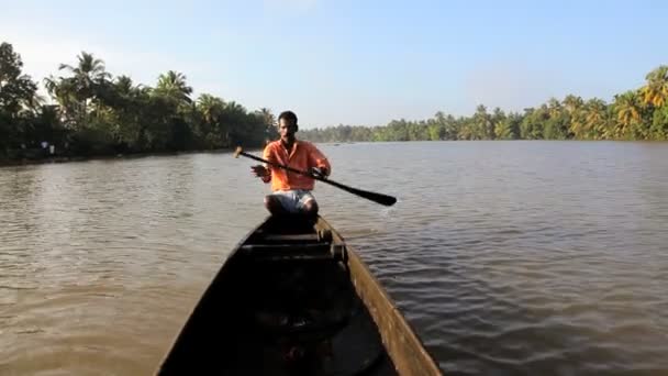 Canoeing by local people on backwaters — Stock Video