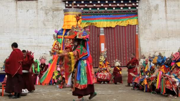 Masked dancers watching a dance festival — Stock Video