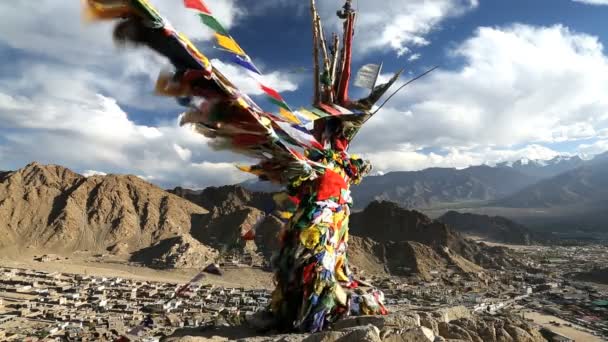 Buddhist prayer flags flying above Leh town — Stock Video