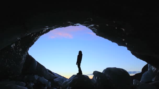 Male figure in glacier Ice Cave