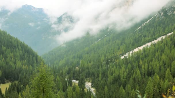 Scenic alpine valley between rocky peaks — Stock Video