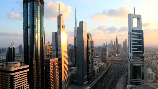 Dubai UAE Sheikh Zayed Road skyscraper Burj Kalifa sunset — Stock Video