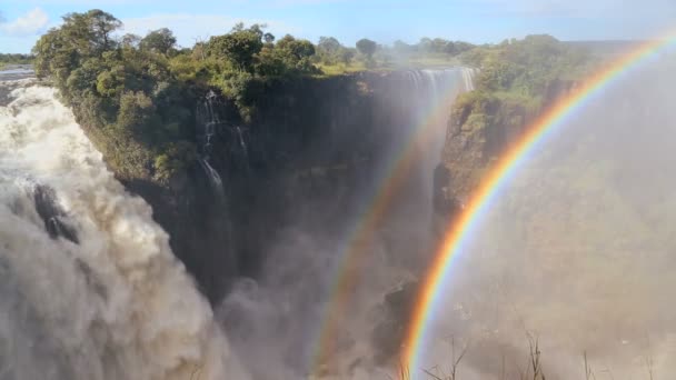 Victoria Falls Zimbabwe Africa Cascada arco iris Río Zambezi — Vídeos de Stock
