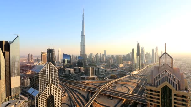 Dubai UAE Sheikh Zayed Road skyscraper Burj Kalifa sunset — Stock Video