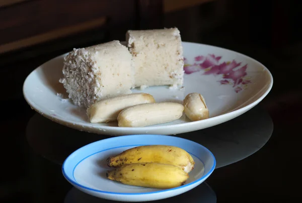 South Indian breakfast puttu and banana in the plate
