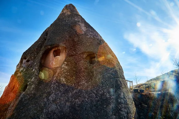 Funny and strange Cappadocia rock houses in Goreme in Anatolia, Turkey. Ruins of an ancient city. The concept of the historic voyage