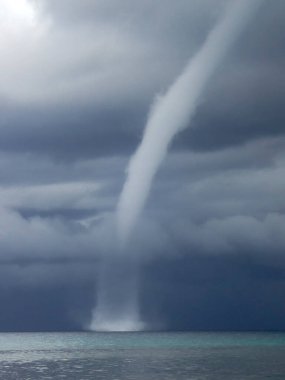 A waterspout off the beach in Malapascua, Philippines clipart