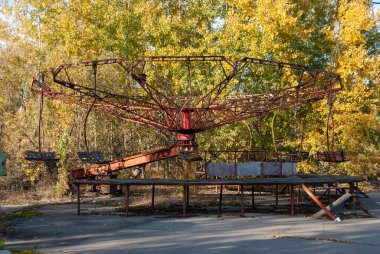 The abandoned amusement park in Pripyat following the nuclear disaster at Chernobyl, Ukraine clipart