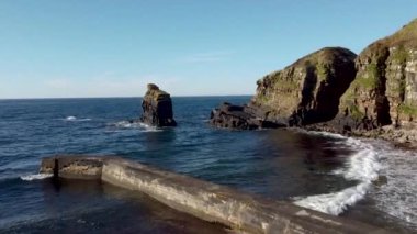 4k drone footage of the small harbour at Latheronwheel on the coast of Caithness, Scottish Highlands, UK