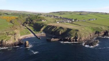 4k drone footage of the small harbour at Latheronwheel on the coast of Caithness, Scottish Highlands, UK