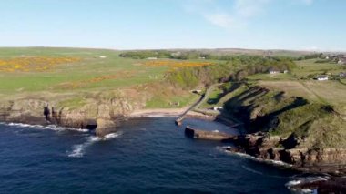 4k drone footage of the small harbour at Latheronwheel on the coast of Caithness, Scottish Highlands, UK