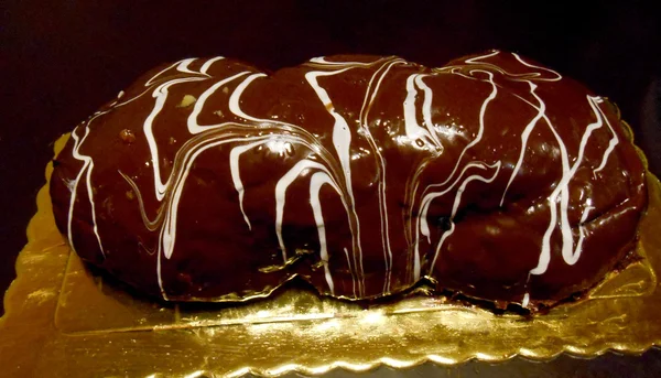 Chocolate covered brioche — Stock Photo, Image