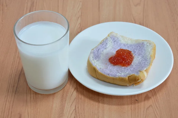 Milk and slice bread mixed with taro topping jam — Stock Photo, Image