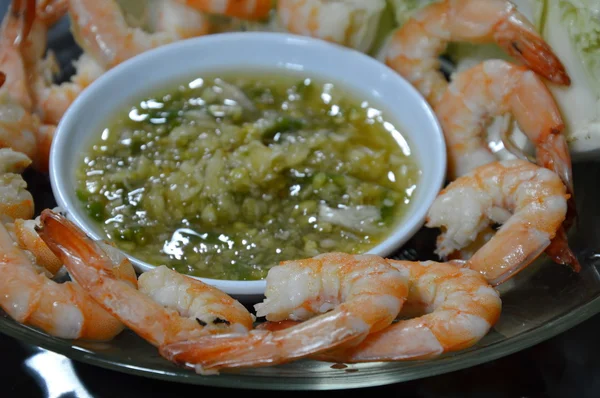 Shrimp cocktail and spicy sauce on dish — Stock Photo, Image