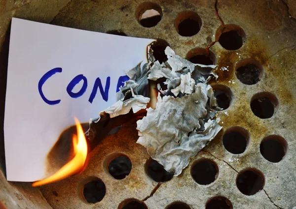 Envelope burn on clay stove — Stock Photo, Image