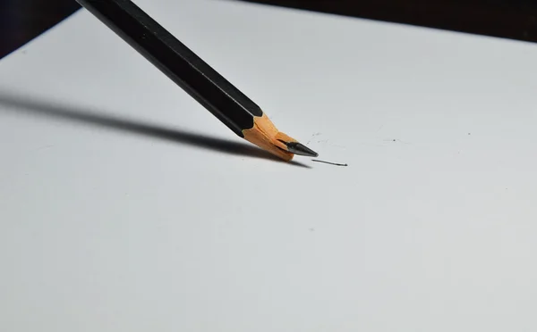 pencil lead crack on white paper