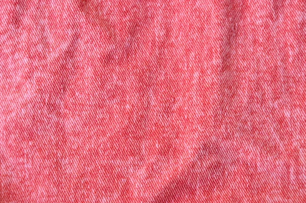 Текстура червоної джинсової тканини та фон — стокове фото
