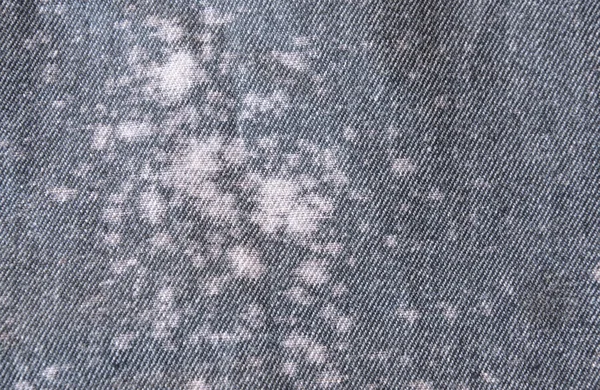 Mancha sobre la textura y el fondo de la tela de jean —  Fotos de Stock