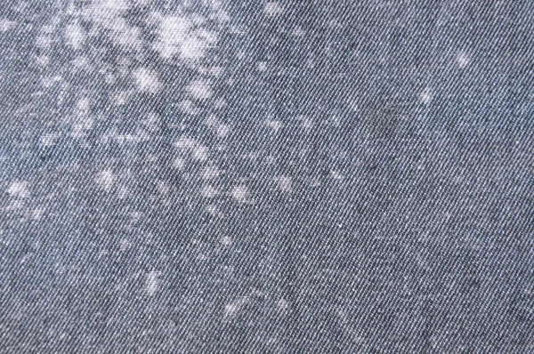 Фарба на текстурі джинсової тканини та фоні — стокове фото