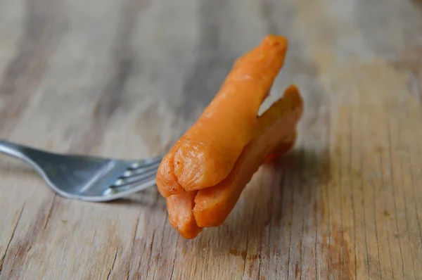 Hot-dog stab Fork, fából készült táblán — Stock Fotó