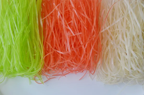 Dried colorful Thai rice noodle on white dish — Stock Photo, Image