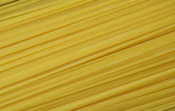 Textur und Hintergrund der getrockneten Spaghetti — Stockfoto