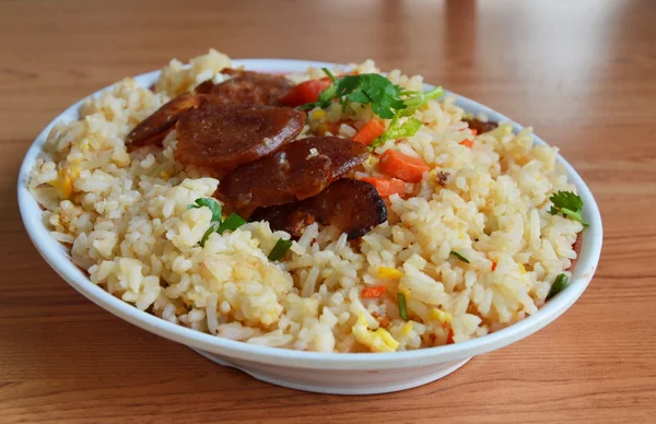 Fried rice with Chinese sausage on dish — Stock Photo, Image