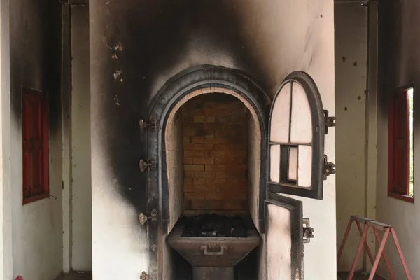 door for push coffin to burning in cremation furnace building
