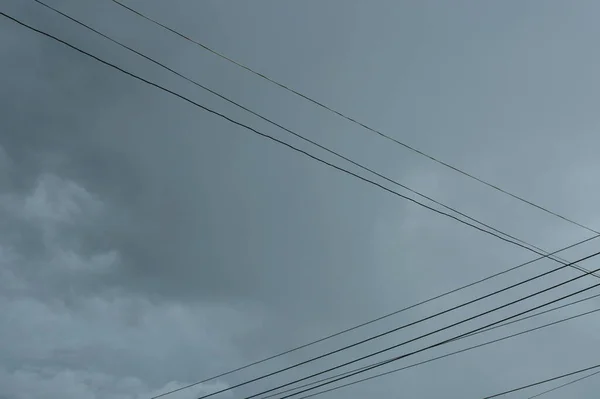 Electric Cable Wire Intersection Dark Rain Cloud Sky Background — Fotografia de Stock