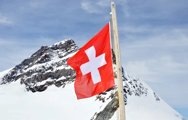 Bandera de Suiza en la montaña Jungfrau — Foto de Stock