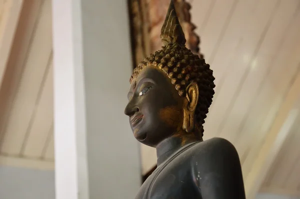 Black Buddha in low angle — Stock Photo, Image