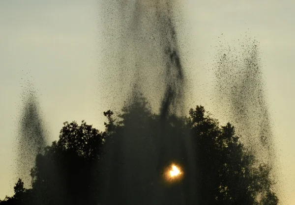 High fountain and the sunset — Stock Photo, Image