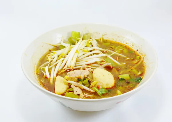 Pork ball and pork sliced in black spicy soup — Stock Photo, Image