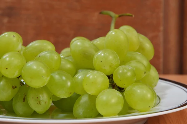 Green grape on dish Royalty Free Stock Photos