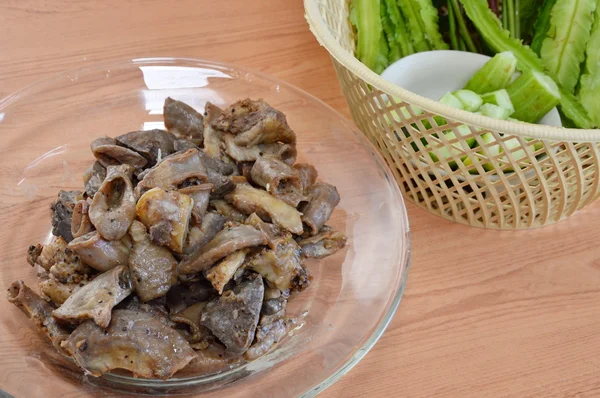 Fried pork entrails with garlic and vegetable — Stock Photo, Image