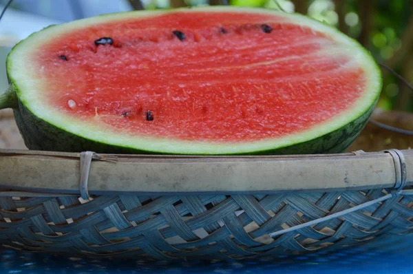 Watermelon on bamboo shallow tray — Stock Photo, Image