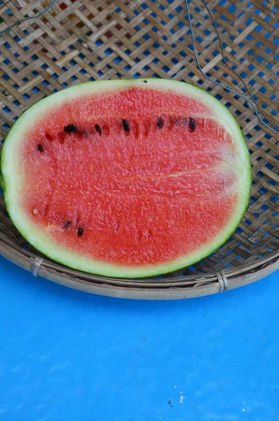 Watermelon on bamboo shallow tray — Stock Photo, Image