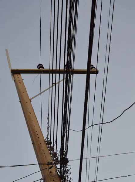 Electric pole på sunset — Stockfoto