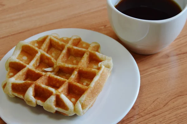 Waffle and coffee on table — Stock Photo, Image