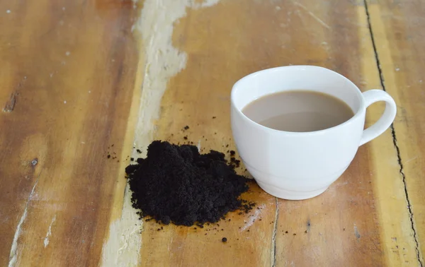 Filiżanka kawy a kawa peeling — Zdjęcie stockowe