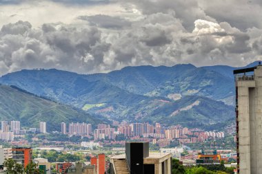 Colombian Cityscapes of Latin America. Panoramic view of Medellin, Antioquia, Colombia Beautiful mountains skylines, busy transportation center.