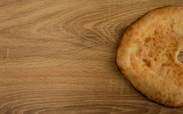 Stekt sol flapjack på trä bakgrund med kopia utrymme — Stockfoto