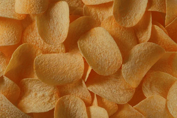 Aardappelchips in direct zonlicht voor achtergrond — Stockfoto