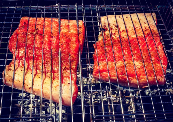 Salmon steak grilling, toned effect — Stock Photo, Image
