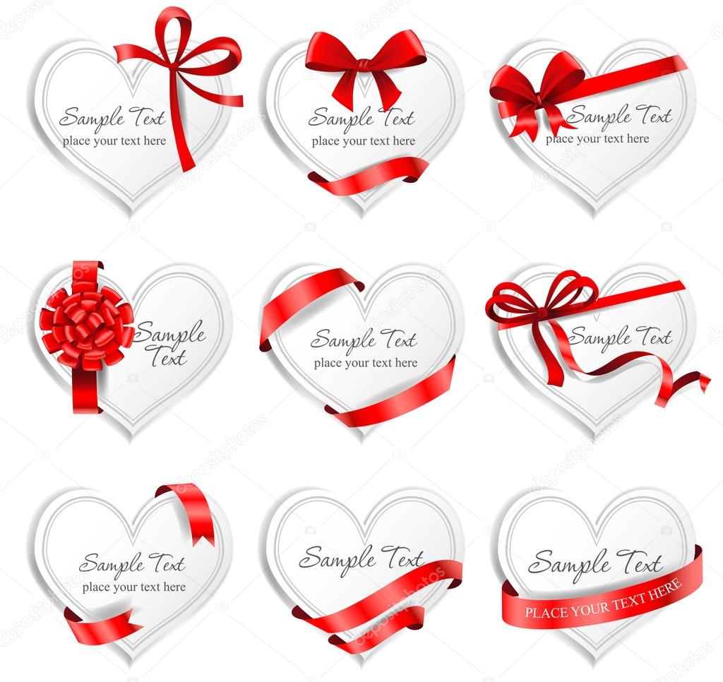Festive heart-shaped  cards with red gift ribbons.