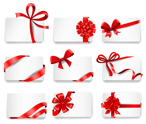 Tarjetas festivas con cintas de regalo rojas . — Vector de stock